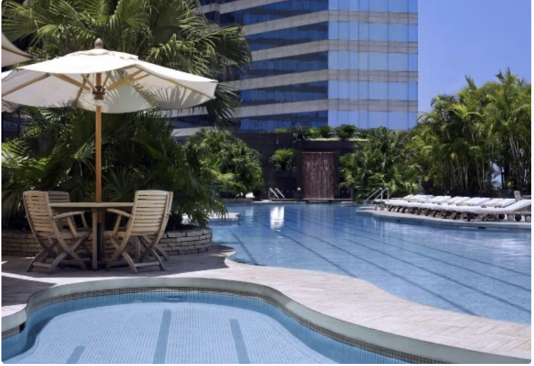 Outdoor pool area at Grand Hyatt Hong Kong, great for families with kids